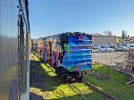 Colorful mural painted on an old boxcar